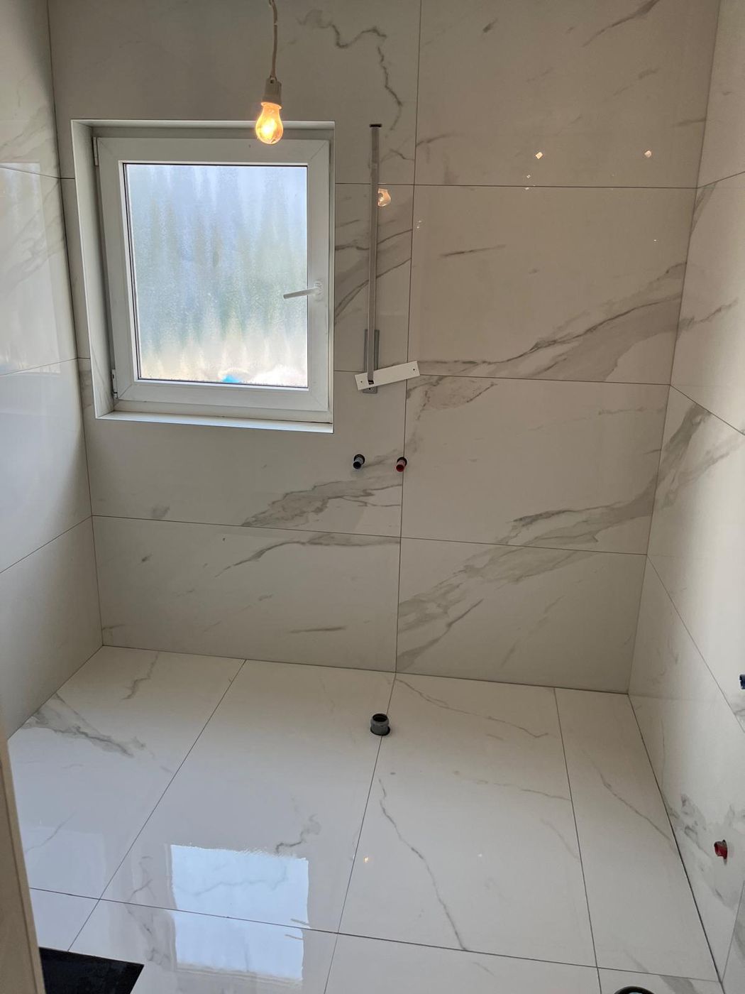 Bodengleiche Dusche mit Fenster